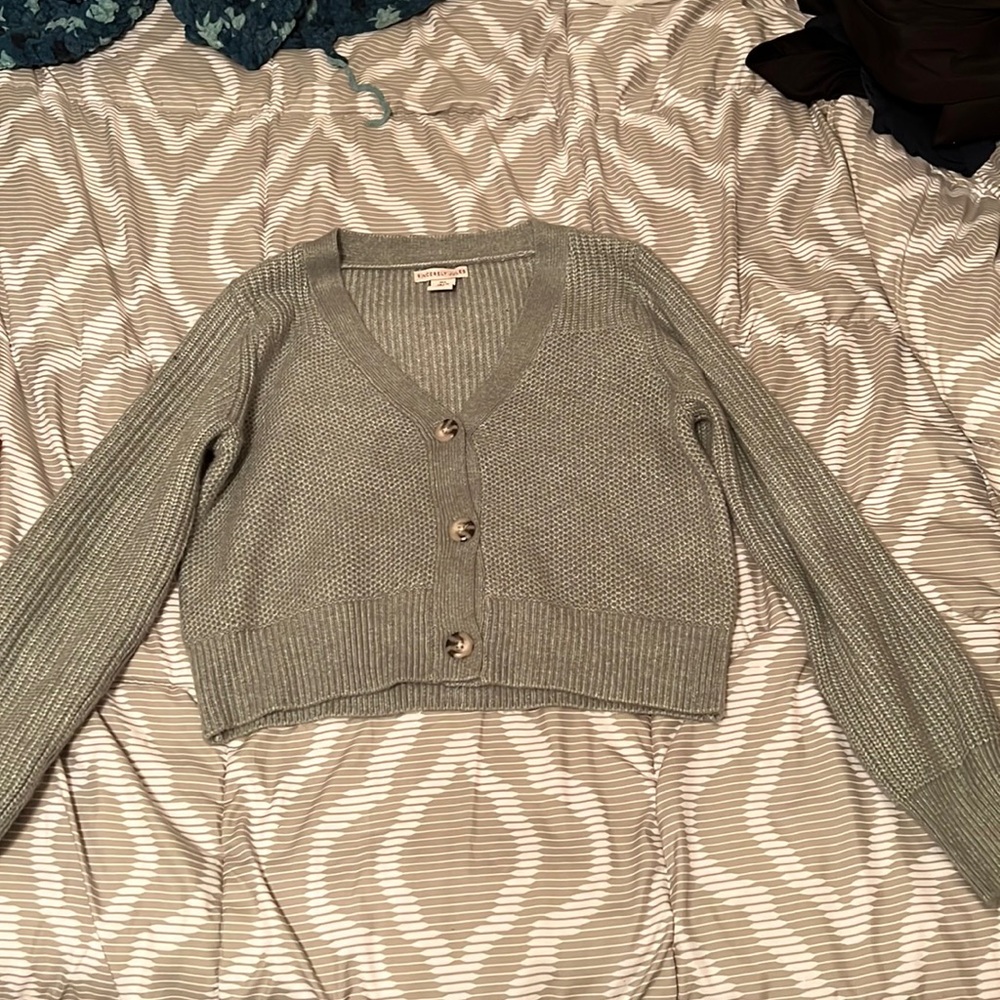 green sweater, never worn before, size L